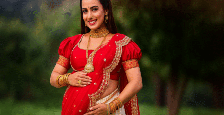 Pregnant Indian woman in saree during maternity photoshoot